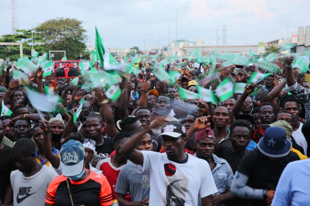 LAGOS, NIGERIA - OCTOBER 20: Demonstrators protest police brutality at the Lekki toll gate on October...