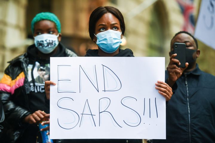 Protesters demonstrate outside the Nigeria High Commission in central London, over the Nigerian federal Special Anti-Robbery Squad (Sars)
