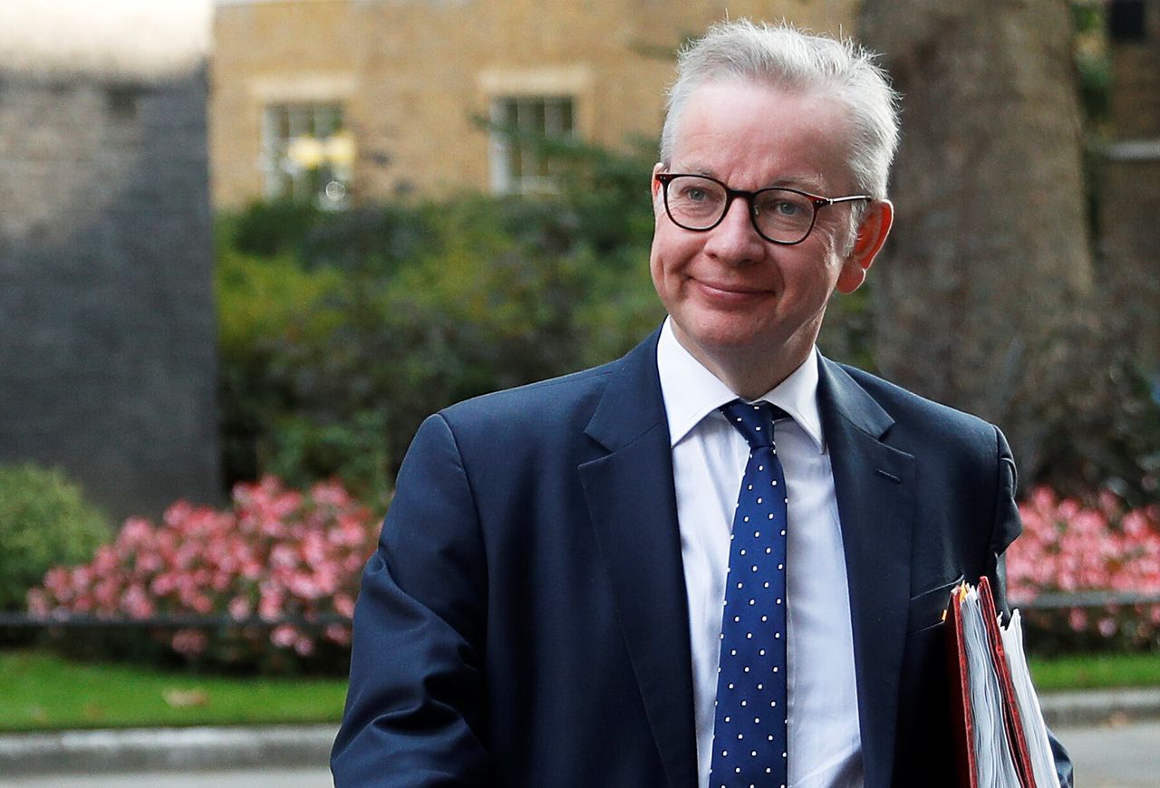 Chancellor of the Duchy of Lancaster Michael Gove walks outside Downing Street in London