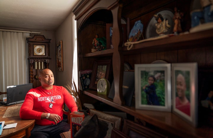 Troy Currence, 48, a medicine man from the Herring Pond Wampanaoag Tribe, sits for a photo at his home in Bourne, Mass., Mond