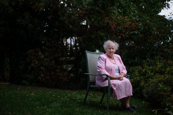 Ginny Mucciaccio, 90, a direct descendant of a Pilgrim who came over on the Mayflower, sits for a portrait in Plymouth, Mass.