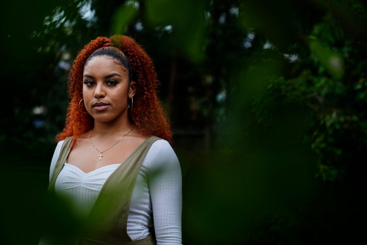Olivia Musoke, 19, a direct descendant of a Pilgrim who came over on the Mayflower, poses for a portrait in Atlanta, on Frida