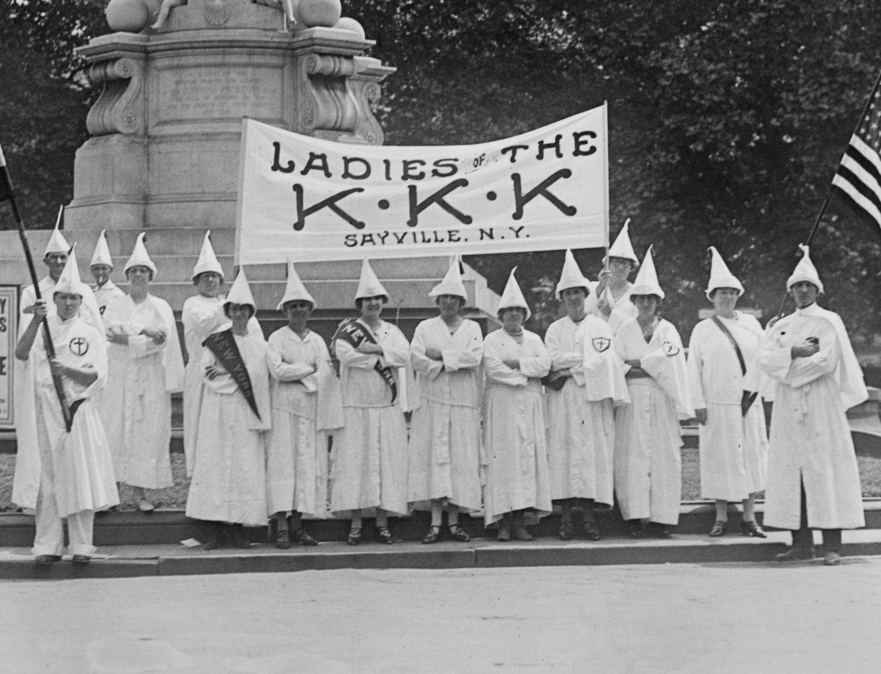 The women's auxiliary of the Ku Klux Klan of Sayville (New York) at the Peace Monument in Washington, D.C., where they participated in a KKK parade in August 1925.