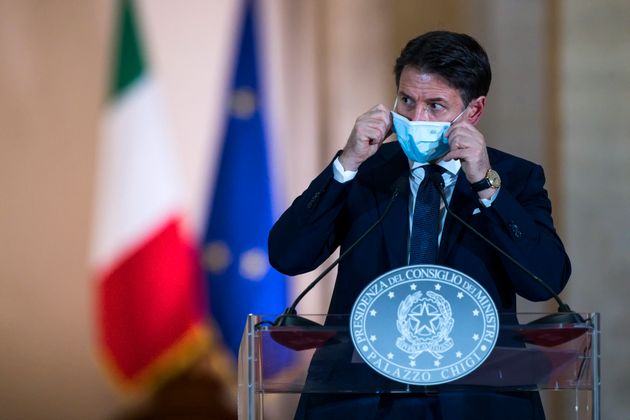 This photo taken on October 18, 2020 and provided by the Italian news agency ANSA shows the Italian Prime Minister ...