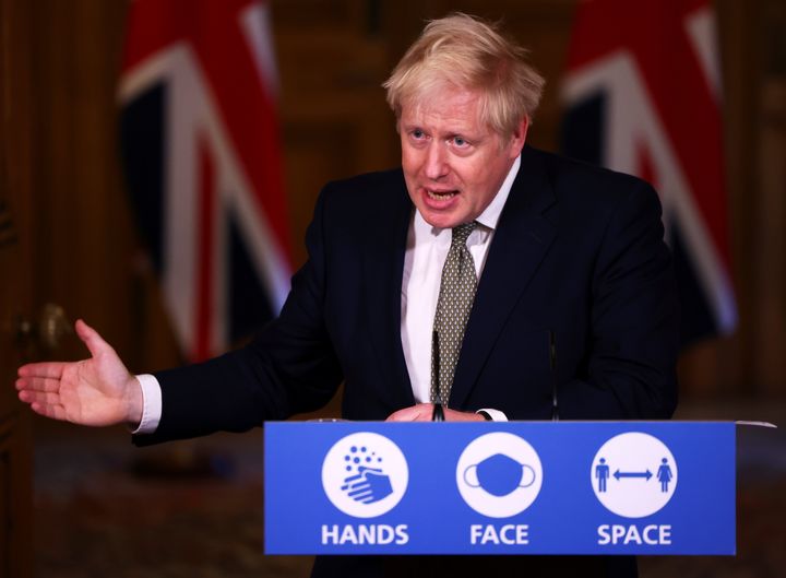 Britain's Prime Minister Boris Johnson attends a news conference on Thursday.