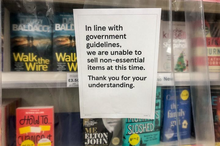 Books in a supermarket near Cardiff are deemed non-essential items and are cordoned off as Wales entered a two-week "firebreak" lockdown from Friday in an attempt to protect the country's NHS from being overwhelmed by the resurgence of coronavirus.