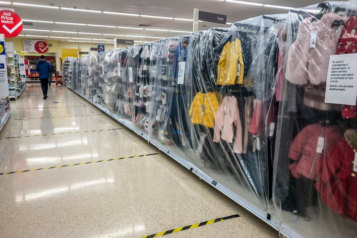 Childrens clothes in a supermarket near Cardiff are deemed non-essential items and are cordoned off as Wales entered a two-week "firebreak" lockdown from Friday in an attempt to protect the country's NHS from being overwhelmed by the resurgence of coronavirus.