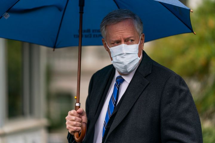 White House chief of staff Mark Meadows responds to reporters questions outside the West Wing on the North Lawn of the White House, Sunday, Oct. 25, 2020, in Washington. (AP Photo/Manuel Balce Ceneta)
