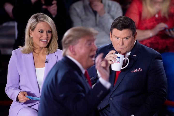 Fox News anchors Martha MacCallum and Bret Baier, pictured in March with Donald Trump, have been asked to quarantine, according to a New York Times report.