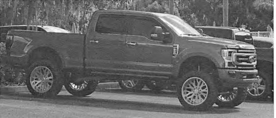 Federal authorities said they photographed Keith William Nicoletta driving this 2020 special-edition Ford F-250 pickup truck from his Dade City home to a local country club where he played golf.