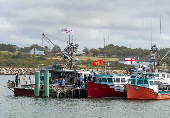 Members of the Sipekne'katik First Nation prepare to go fishing in Saulnierville, N.S., on, Sept. 17, 2020.