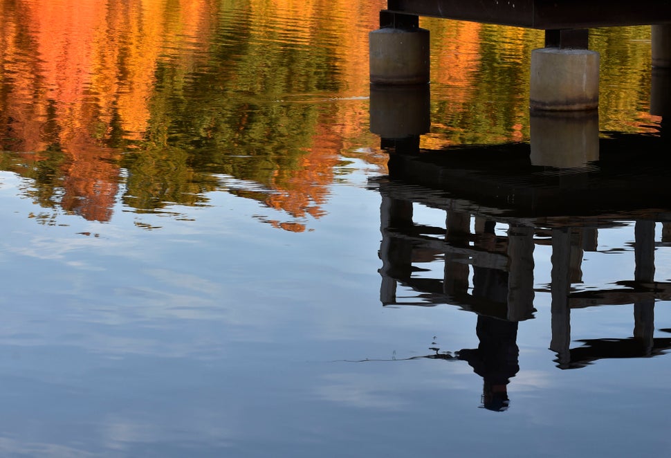 A fisherman reflected in Lake Frances at Frances Slocum State Park, Pennsylvania, on Oct. 14, 2020.&nbsp;