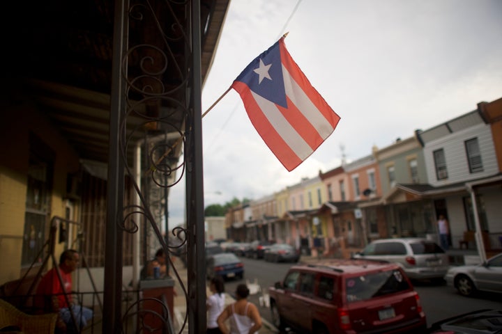 A Puerto Rican flag flies in North Philadelphia in 2018. Pennsylvania was a top destination for Puerto Ricans leaving the island after Hurricane Maria in 2017.