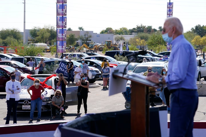 Supporters watch as Democratic presidential nominee Joe Biden speaks at a Las Vegas drive-In campaign event on Oct. 9.