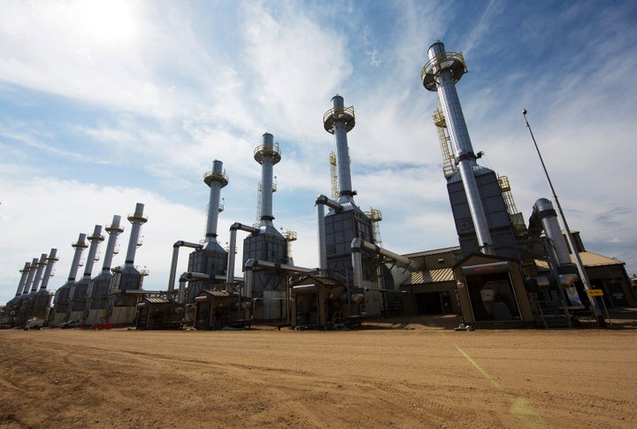 Steam generators at the Christina Lake Cenovus Energy project, 120 km south of Fort McMurray, Alta., Aug. 15, 2013. Cenovus is planning major layoffs after announcing a merger with Husky Energy earlier this week.