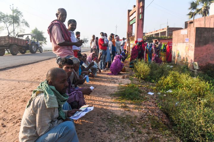 Voters outside a polling station in Patna on October 28, 2020.
