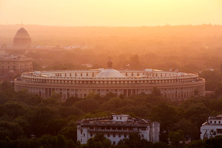 India, Delhi, New Delhi, Parliament Building at sunset, pollution, smog