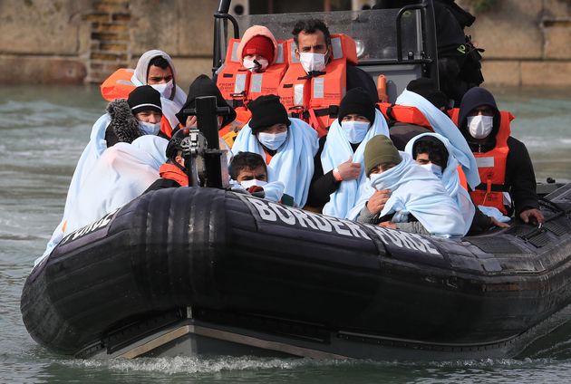 A group of people thought to be migrants are brought into Dover, Kent, by Border Force following a small boat incident in the Channel.