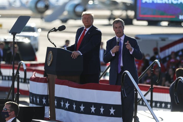 Nigel Farage speaks next to Donald Trump during a campaign rally at Phoenix Goodyear Airport in Goodyear, Arizona.