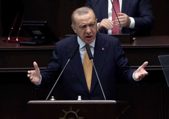 Turkey's President Recep Tayyip Erdogan addresses his ruling party lawmakers at the parliament, in Ankara, Turkey, Wednesday, Oct. 28, 2020. 