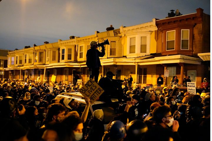 Protesters confront police during a march Tuesday Oct. 27, 2020 in Philadelphia. Hundreds of demonstrators marched in West Philadelphia over the death of Walter Wallace, a Black man who was killed by police in Philadelphia on Monday.
