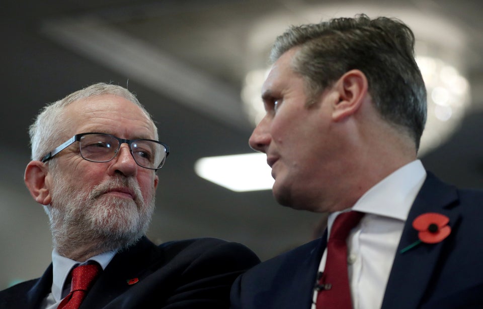 Former Labour leader Jeremy Corbyn with Keir Starmer