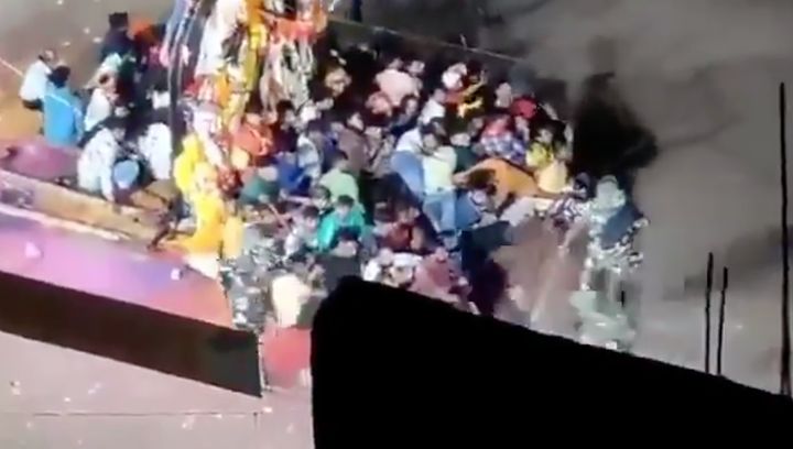 Screenshot from a video from the incident in Munger that shows police personnel attacking participants in a Durga Puja procession. 