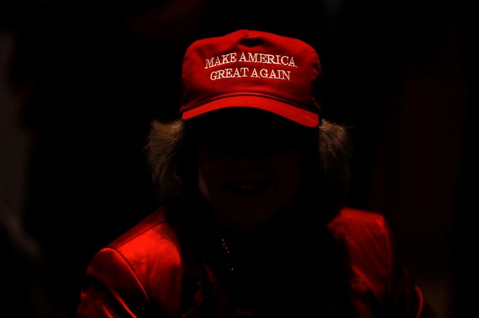 A supporter of Trump and Republican senate candidate Mike Braun attends the election night party in Indianapolis, Indiana on Nov. 6, 2018. 