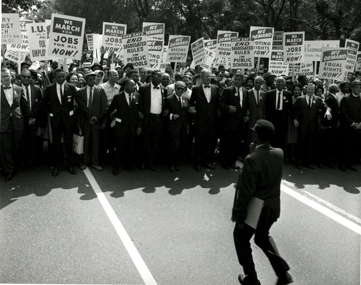 Civil Rights leaders holds hands as they march along the National Mall during the March on Washington for Jobs and Freedom, Washington DC, August 28, 1963. 