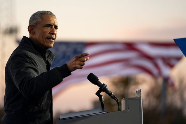 Former president Barack Obama speaks during a drive-in campaign rally with Democratic presidential nominee Joe Biden in Detroit, Mich., on October 31, 2020.