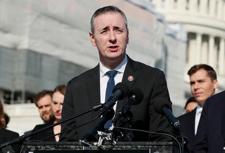 Rep. Brian Fitzpatrick (R-Pa.), seen here speaking at a press conference for ending the use of "forever chemicals," is locked in a tough reelection fight despite some moderate votes.