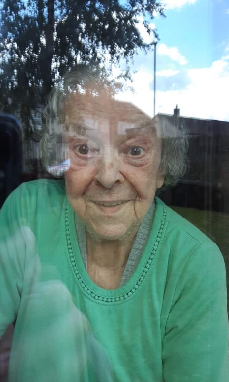 Carol Milnes' mother Margaret Johnson during a window visit at her Yorkshire care home 