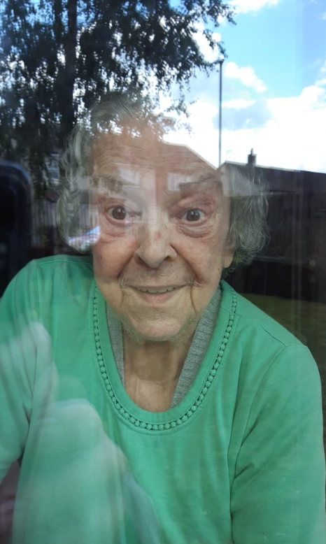 Carol Milnes' mother Margaret Johnson during a window visit at her Yorkshire care home
