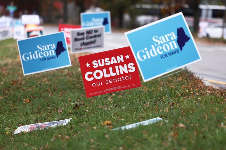 Political signs line the side of the road on Franklin Street on November 01, 2020 in Portland, Maine. (Photo by Michael M. Sa