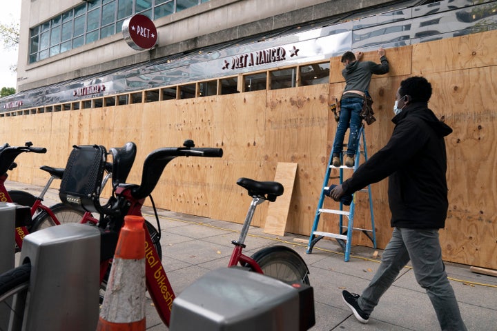 A Pret A Manger restaurant in downtown Washington, not far from the White House, is seen being boarded up on Friday ahead of this week's election and possible demonstrations.