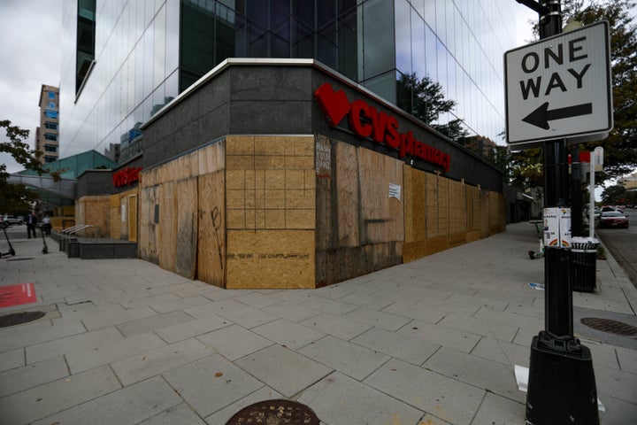 Retailers have been boarding up their stores ahead of Tuesday's election. A boarded-up CVS store in Washington, D.C., is pict