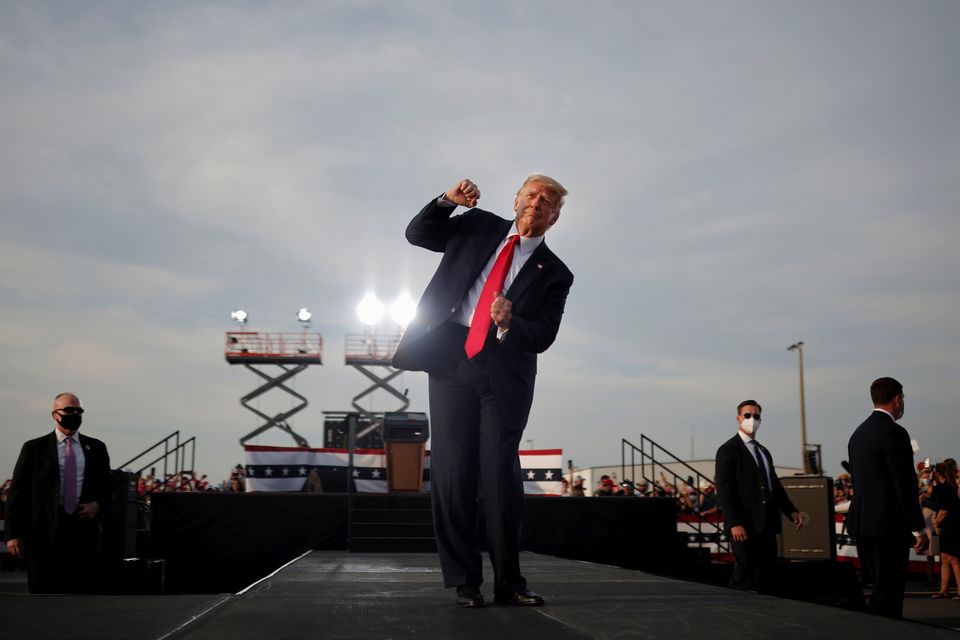 Trump at the end of his campaign rally in Ocala, Florida.