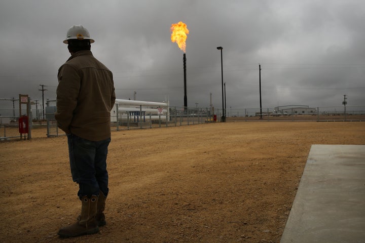 Flared natural gas is burned off at Apache Corporations operations at the Deadwood natural gas plant in the Permian Basin in