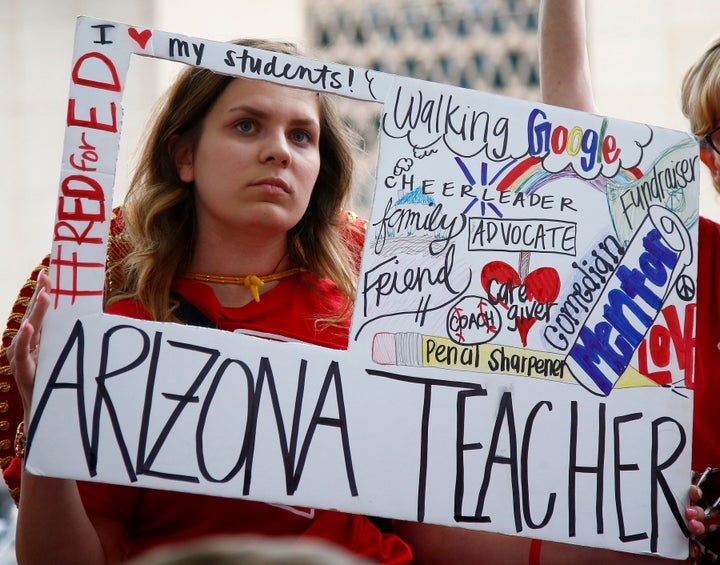 Public school teacher Taylor Dutro participates in a protest in May 2018. A ballot measure passed in this week's election by Arizona voters was an outgrowth of the teacher strikes there and in other states that began two years ago.