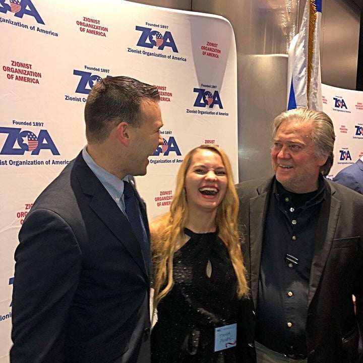 Jack Posobiec, his wife, Tanya Gorbach, and Steve Bannon share a laugh in 2017.