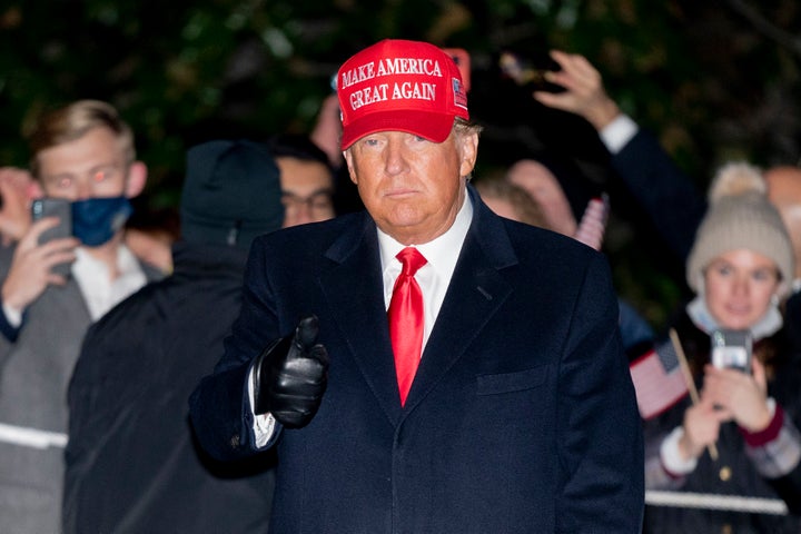 President Donald Trump gestures as he walks on the South Lawn of the White House in Washington, Tuesday, Nov. 3, 2020, after stepping off Marine One and greeting supporters. (AP Photo/Patrick Semansky)