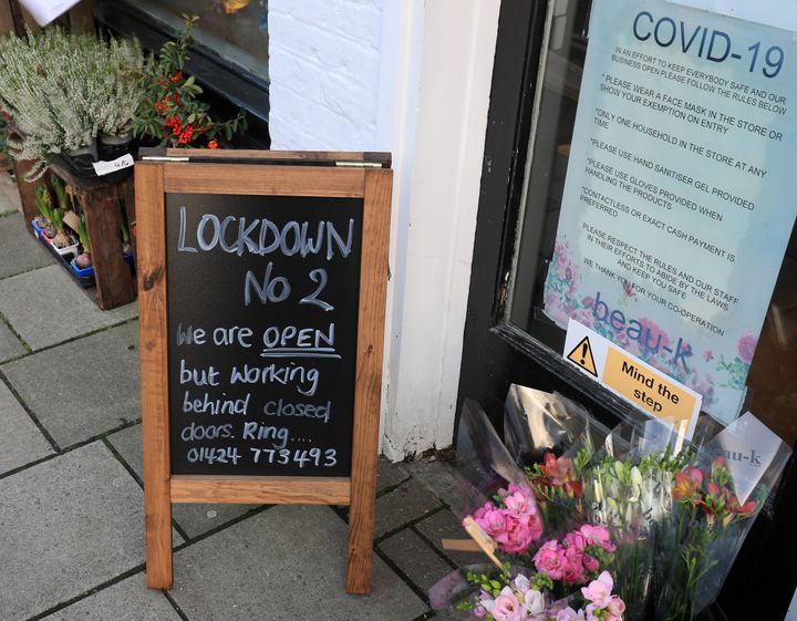 A sign outside beau-k florists in Battle, East Sussex, ahead of a national lockdown for England from Thursday.