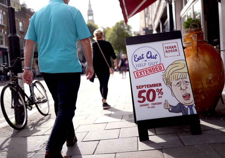 A sign outside the Terra Rossa restaurant on Upper Street in Islington, North London, promoting an extension of the Eat Out to Help Out food discount scheme for its customers.