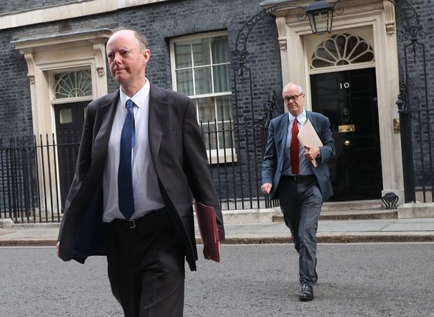 The government's chief medical officer Chris Whitty (left) and chief scientific adviser Patrick Vallance leave 10 Downing Street, London. 