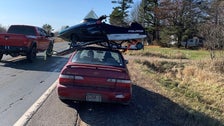 Wisconsin Trooper Stops Driver Hauling Snowmobile Atop Car 2 5fa19d41240000bf3161efc0