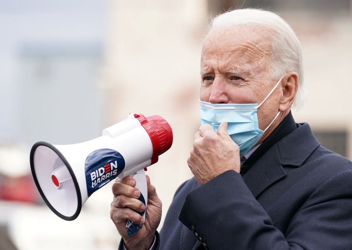 Democratic presidential nominee Joe Biden holds a megaphone during an Election Day event in his hometown of Scranton, Pennsylvania, on Nov. 3, 2020.