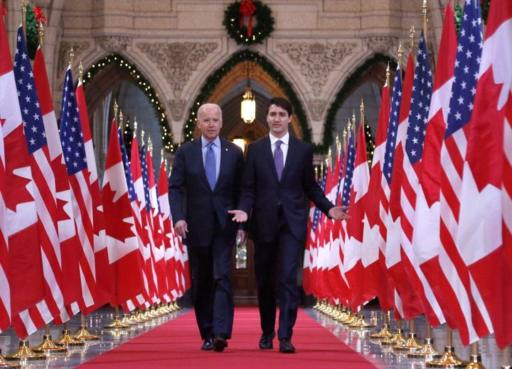 Prime Minister Justin Trudeau and then-U.S. vice-president Joe Biden walk down the Hall of Honour on Parliament Hill on Dec. 9, 2016.