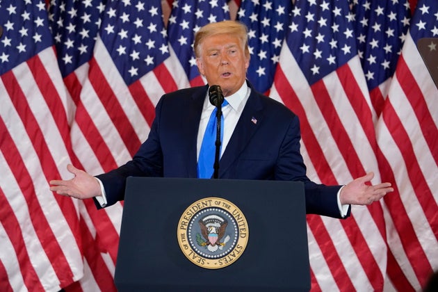 President Donald Trump speaks in the East Room of the White House, early Wednesday, Nov. 4, 2020, in...