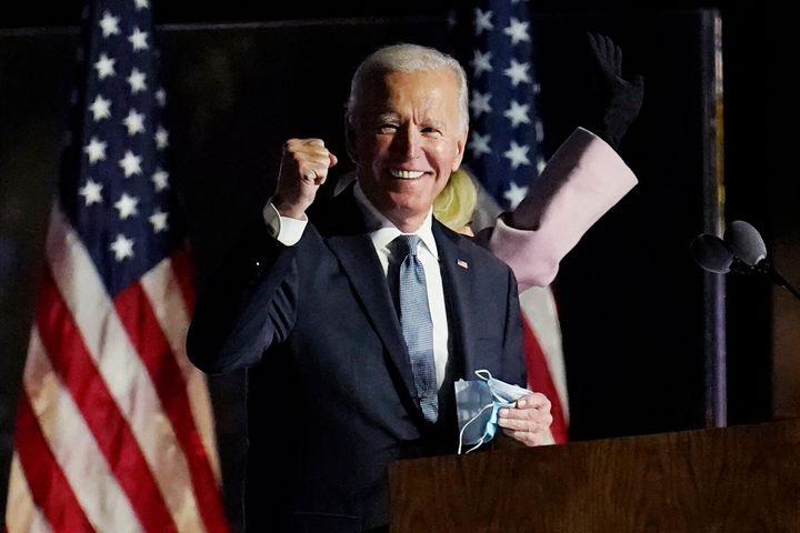 Former Vice President Joe Biden speaks to supporters early Wednesday. Later in the day, he won crucial swing states that mean he is in striking distance of the 270 electoral votes he needs to win the presidential election. 
