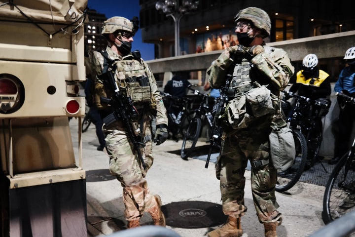 National Guard soldiers patrol the streets the morning after Americans voted in the presidential election on Nov. 4, 2020, in